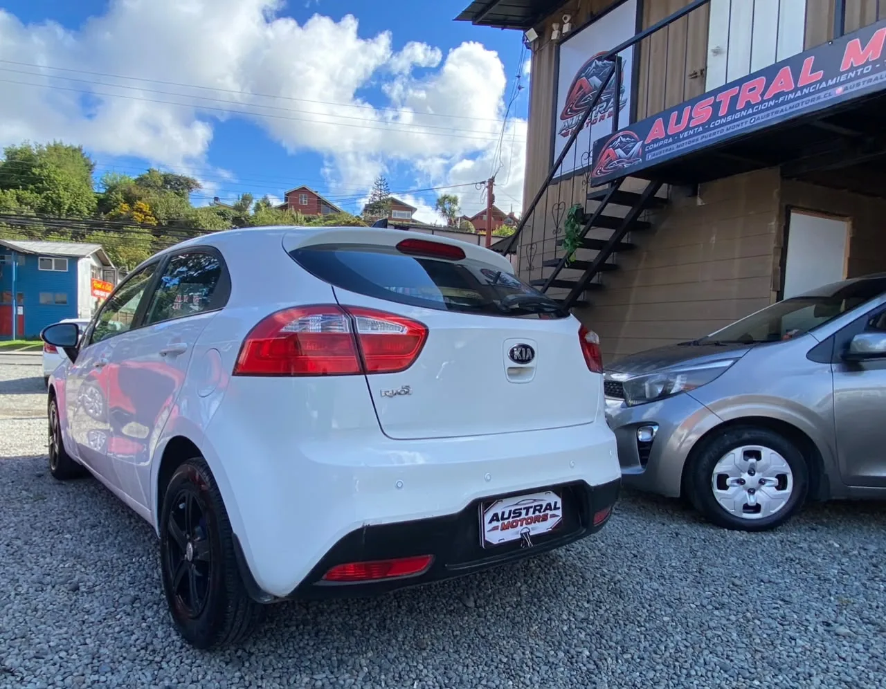 Kia Rio 5 2014 — foto 13