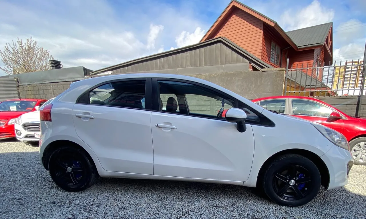 Kia Rio 5 2014 — foto 5